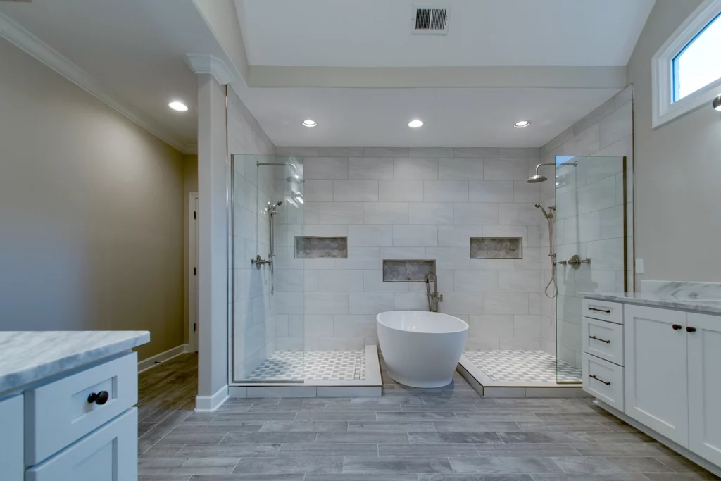 Nashville bathroom remodel with dual open showers and free standing tub