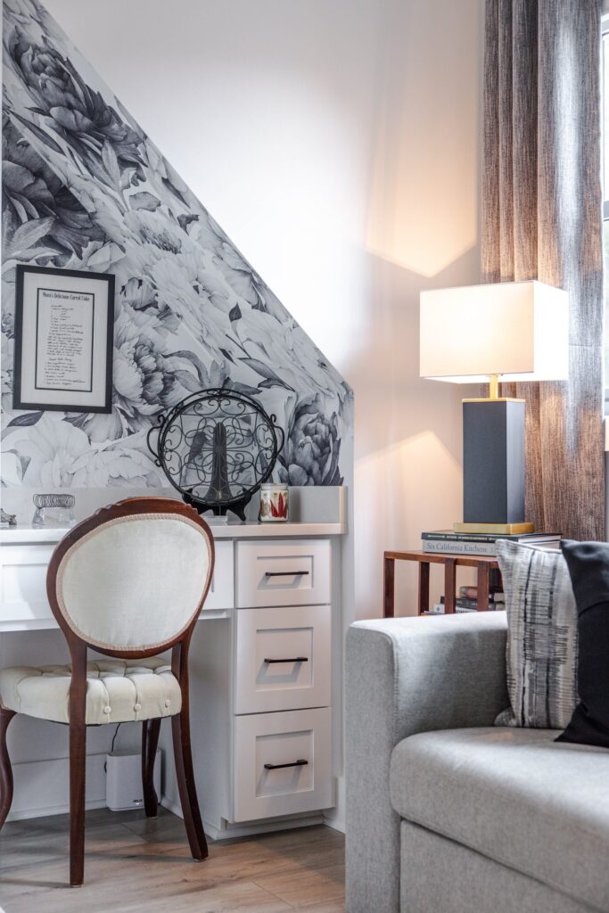 A well-organized home office with natural lighting, a desk, and storage designed for productivity and focus in Nashville