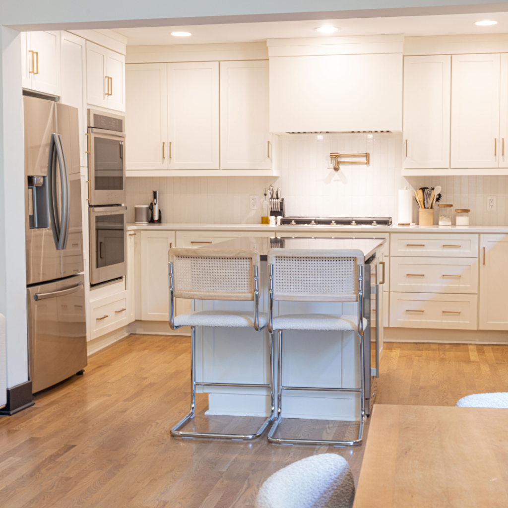 Elegant white kitchen in a newly constructed home with modern finishes and high-end appliances.