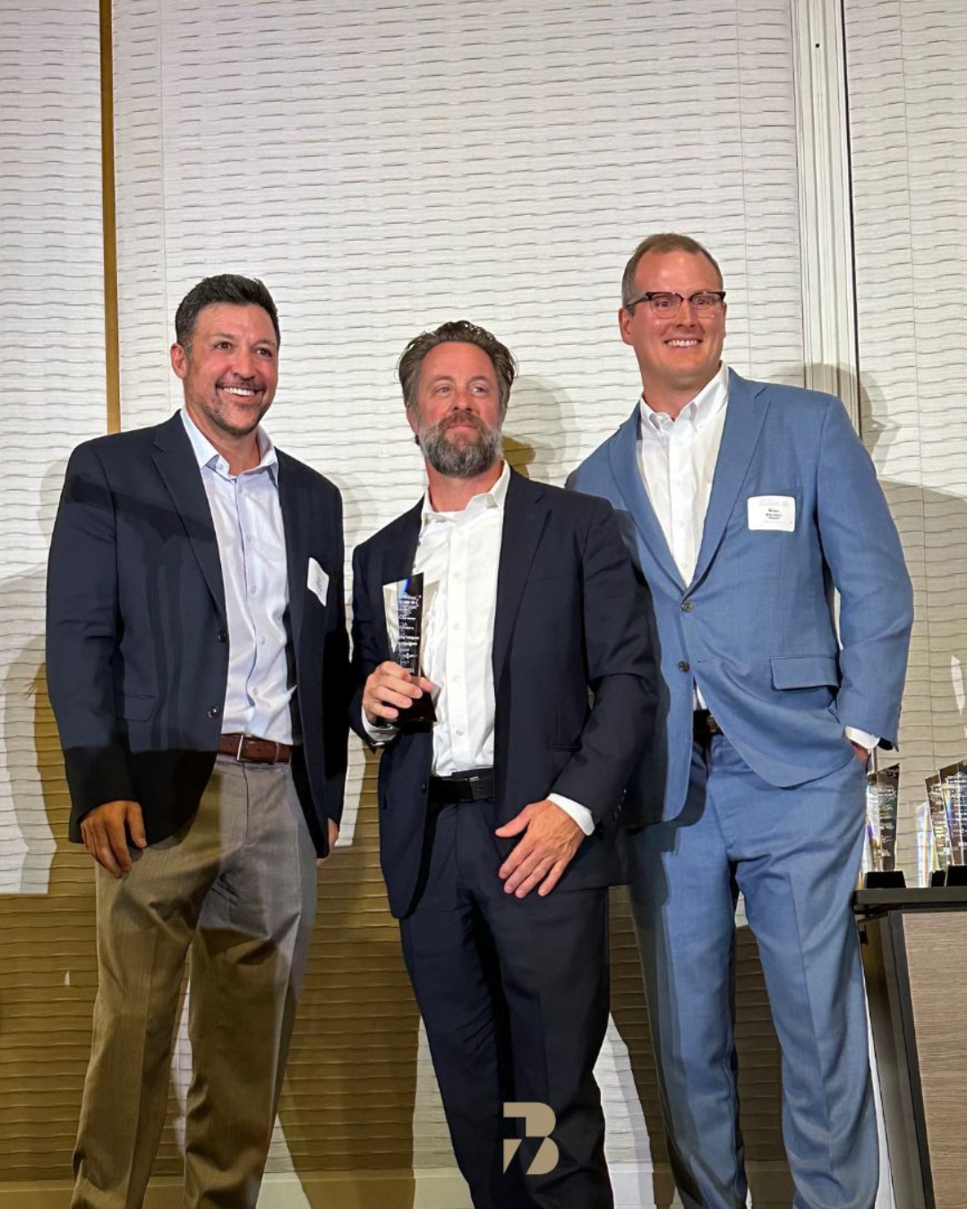 Matt Millsap of BuildCo7 receiving an award for excellence in custom home building in East Nashville.