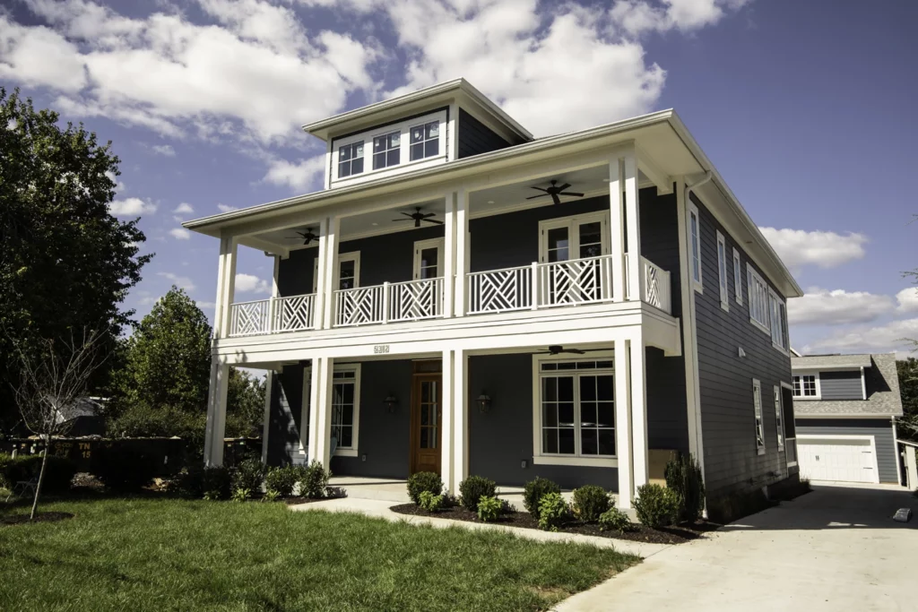 Sylvan Park custom built home with 2 stories with white columns and balcony